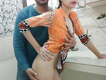 Nasty landlord plows Indian Bhabhi's cock-squeezing cunt in the kitchen