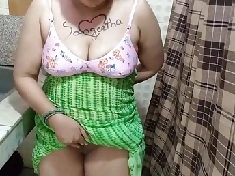 Hot Indian bhabhi Sangeeta gets their way big tits fingered while hot together with heavy with hot Telugu audio